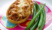 Mini chicken pot pie with green beans on colorful plate