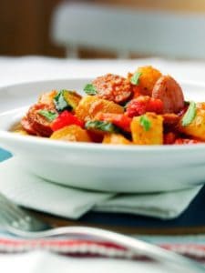 Close-up of spicy sausage and vegetable stew in bowl