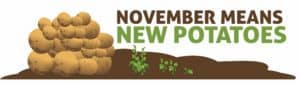 Pile of potatoes in soil with "November Means New Potatoes" text