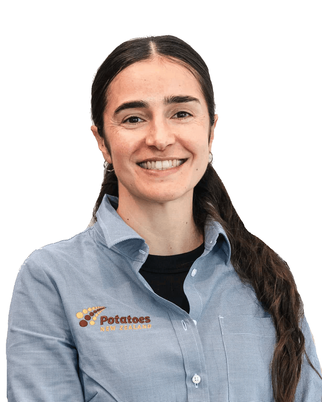 Smiling woman wearing Potatoes New Zealand branded shirt