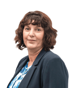 Middle-aged woman with curly brown hair in blazer