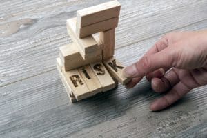 Taking one block from wooden blocks tower,risk managament