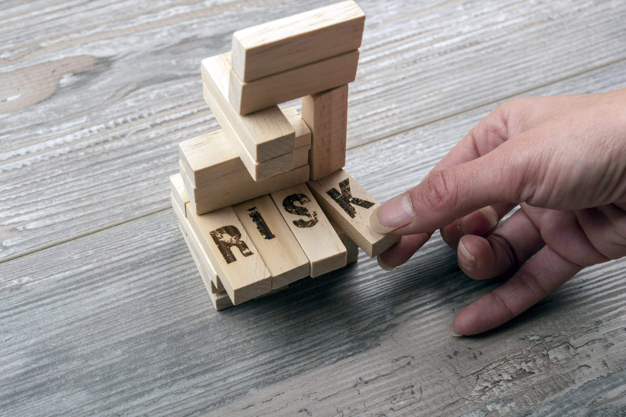 Taking one block from wooden blocks tower,risk managament
