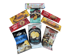 Variety of packaged snacks including chips and biscuits assortment