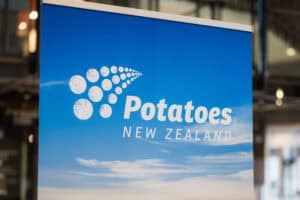 Potatoes New Zealand logo with blue sky background banner
