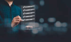 Man checking digital checklist with virtual touchscreen interface