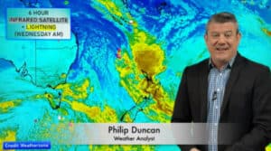 Weather analyst Philip Duncan presenting satellite lightning map.