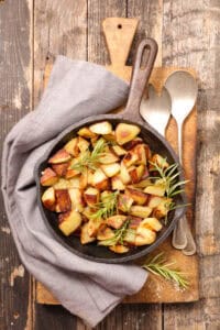 grilled potato with rosemary in pan