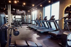 Modern gym interior with treadmills and workout equipment